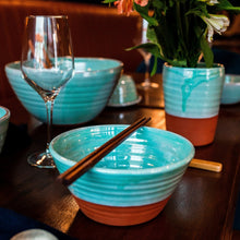 Load image into Gallery viewer, Dining table with ramen bowl, chopsticks, wine glass, large serving bowl and vase.