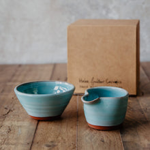 Load image into Gallery viewer, Mini turquoise bowl and mini milk jug in front of a brown gift box