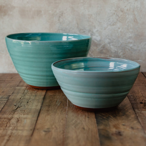 2 large turquoise pottery bowls