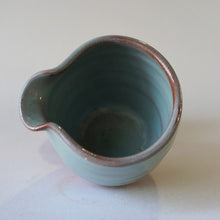 Load image into Gallery viewer, Small handle-less jug seen from above on a white background.
